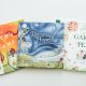 Image shows three picture books: A Lion's Mane, Dreams of Hope and The Garden of Peace
