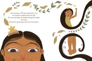 Page spread from Kamal's Kes. On left side you see the face of a south-asian girl with eyes wide and a golden hair comb on the right side of her hair. Leaves swirl above her face. Text reads: One evening, as Kamal combed her keys, she noticed a shadow above her lips. The next morning, the shadow had grown darker, and soon, she found it growing in all sorts of new places. On the spread to the right, the top image shows Kamal wrapped in her long black hair, her left arm raised and looking at her hairy armpit. The image below shows a spot illustration of her hairy legs with her feet curled across each other. A swirl of long black hair continues to the next page.